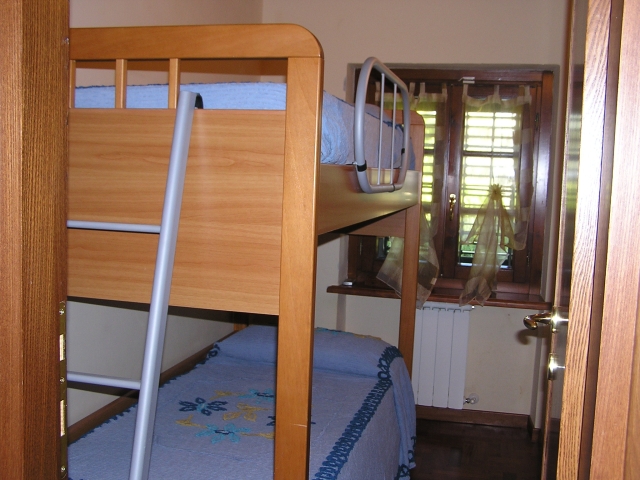 One small bedroom with bunkbeds